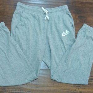 Small, Grey Nike light sweats.